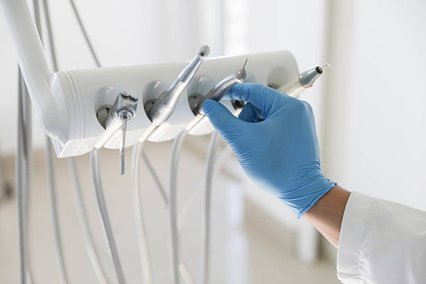Professional Root Canal Treatment technician working in St. James, NY